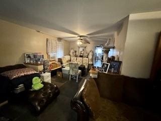 living area with ceiling fan