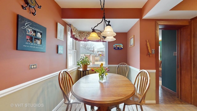 dining room with baseboards