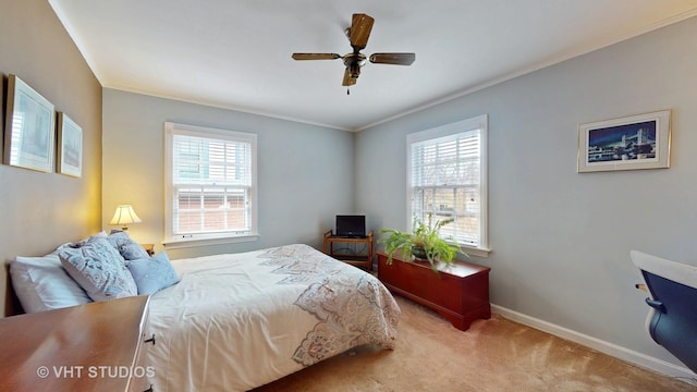 bedroom featuring ornamental molding, carpet, multiple windows, and baseboards