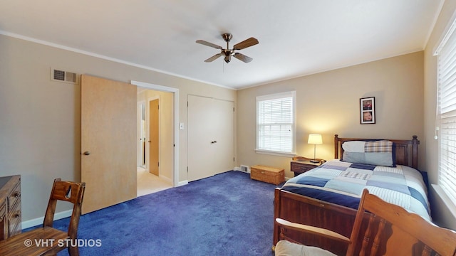 bedroom with carpet floors, visible vents, ornamental molding, ceiling fan, and baseboards