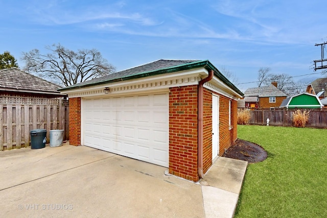 detached garage with fence