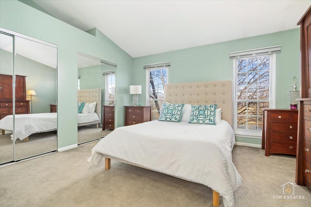 bedroom featuring carpet floors, vaulted ceiling, and baseboards