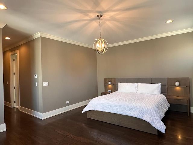 bedroom with a chandelier, recessed lighting, wood finished floors, and baseboards