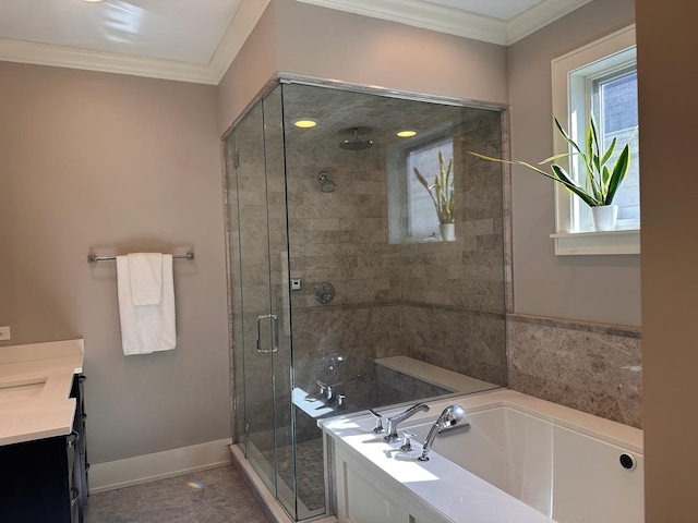 bathroom featuring a garden tub, vanity, baseboards, a shower stall, and crown molding