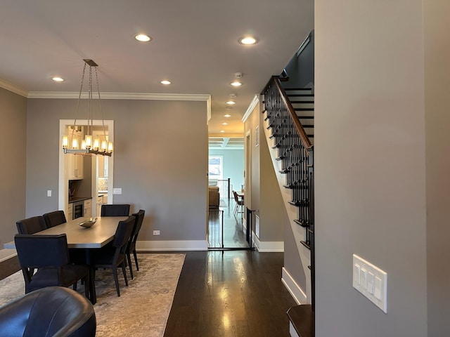 dining space with recessed lighting, baseboards, stairs, ornamental molding, and dark wood finished floors