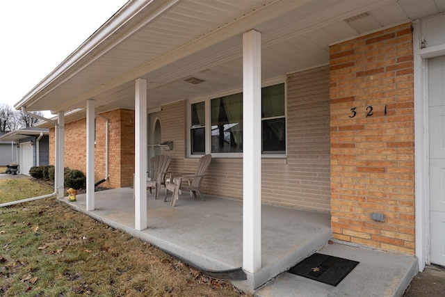 view of patio featuring covered porch