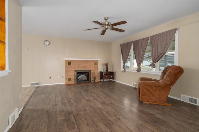 unfurnished living room featuring a fireplace and visible vents