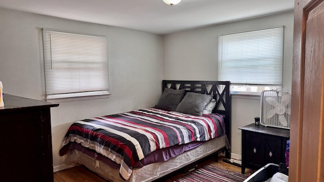 bedroom featuring wood finished floors