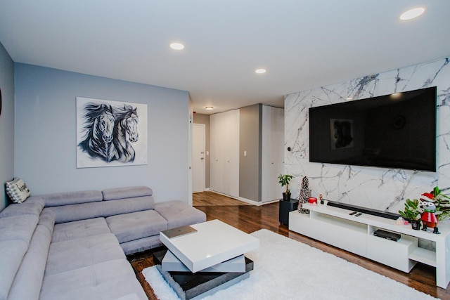 living room featuring wood finished floors and recessed lighting