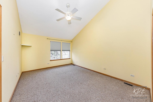 carpeted empty room with high vaulted ceiling, baseboards, visible vents, and ceiling fan