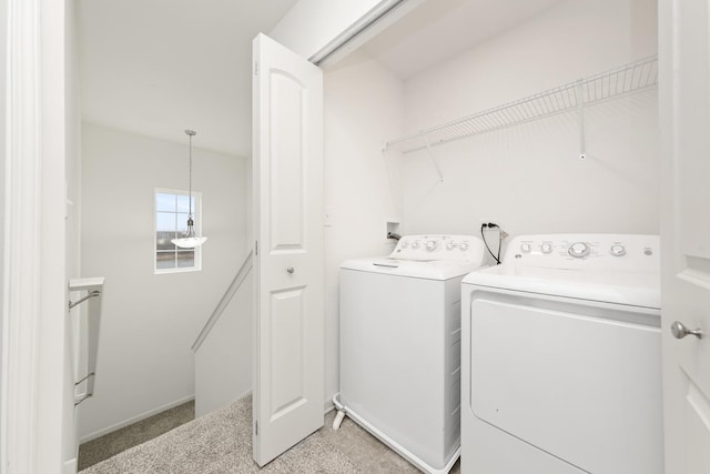 laundry area featuring laundry area and washer and dryer