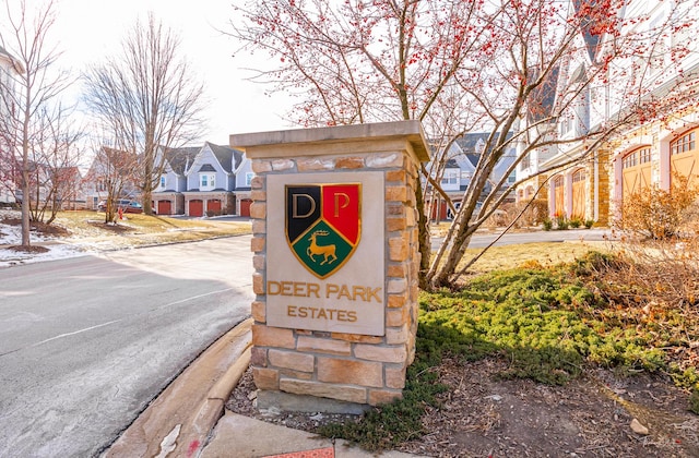 community / neighborhood sign featuring a residential view