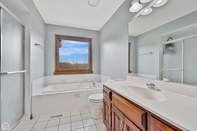 bathroom featuring tile patterned floors, visible vents, and a shower stall