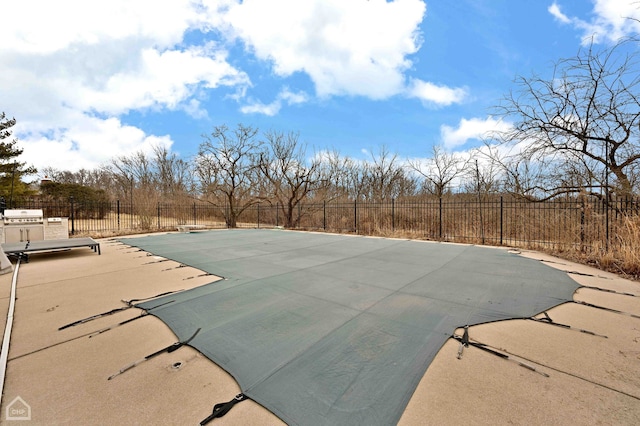 view of pool featuring a patio, fence, and a fenced in pool