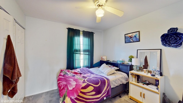 bedroom with carpet floors, a closet, and ceiling fan