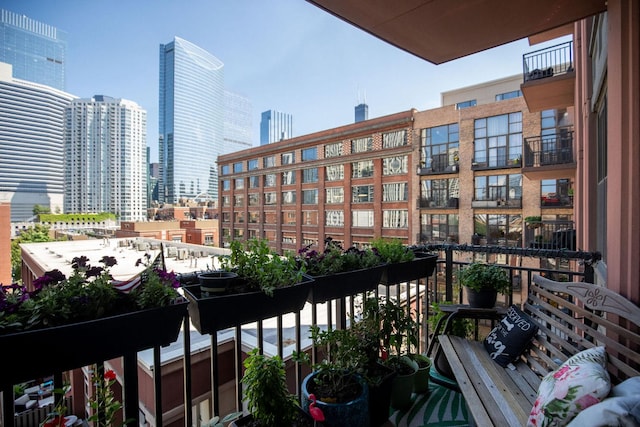 balcony featuring a view of city