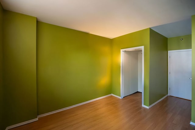 330 N Jefferson St Unit 603, Chicago, IL 60661 - unfurnished room with wood finished floors and baseboards