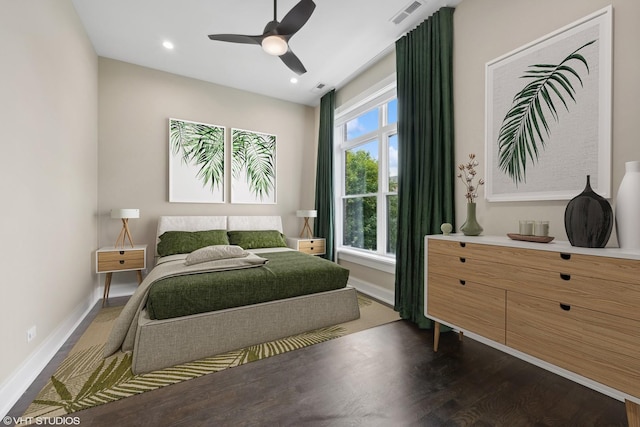 bedroom featuring recessed lighting, visible vents, baseboards, and dark wood-type flooring