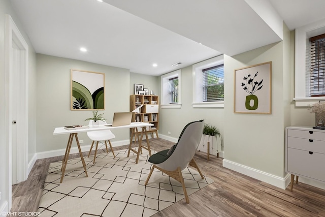 sitting room with recessed lighting, visible vents, baseboards, and wood finished floors