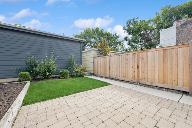 view of patio / terrace featuring fence