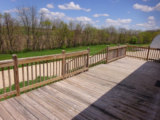 10615 N Coon Rd, Dakota, IL 61018 - wooden terrace featuring a yard and a wooded view