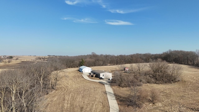 birds eye view of property featuring a rural view