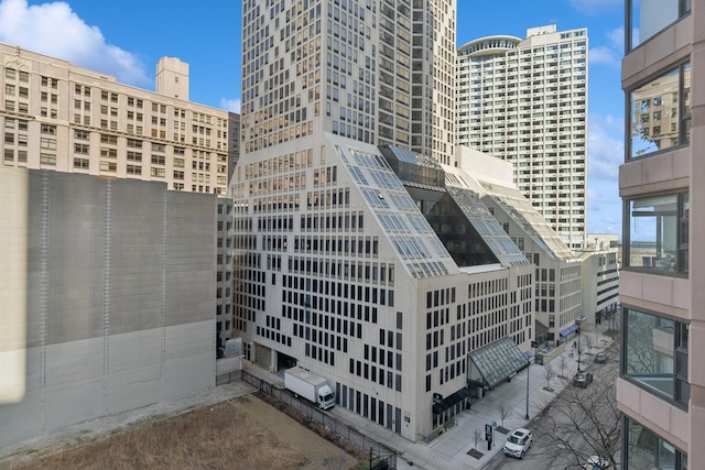 view of building exterior featuring a city view