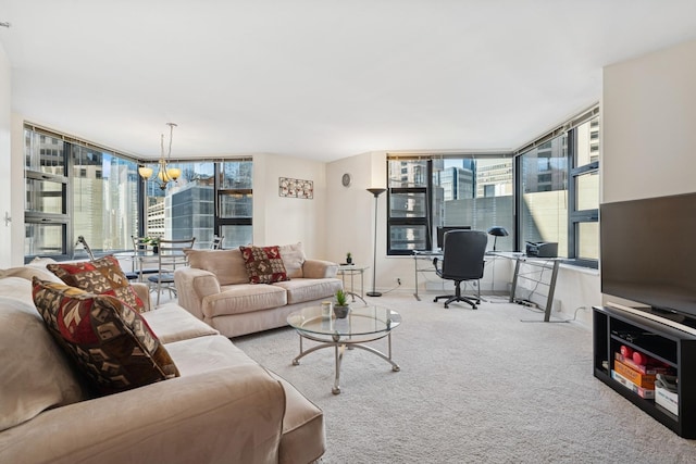 living room featuring a wealth of natural light, carpet flooring, floor to ceiling windows, and a notable chandelier