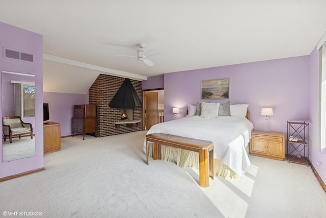 bedroom featuring ceiling fan, light colored carpet, visible vents, baseboards, and vaulted ceiling