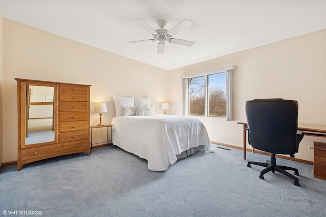 bedroom with lofted ceiling, carpet floors, a ceiling fan, and baseboards