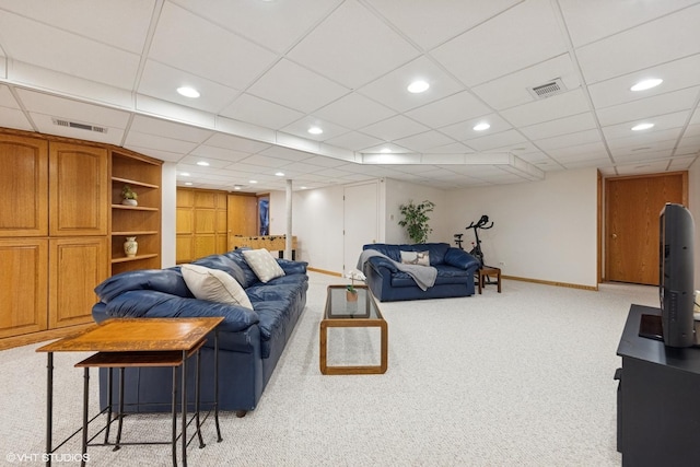 living room featuring recessed lighting, carpet flooring, visible vents, and baseboards