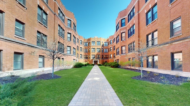 view of community featuring a lawn