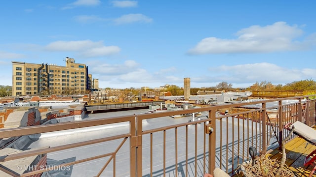 balcony featuring a city view