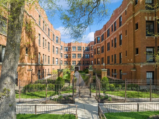 view of building exterior featuring fence