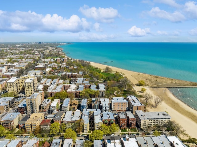 aerial view with a beach view and a water view