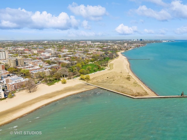 aerial view with a view of city, a water view, and a beach view