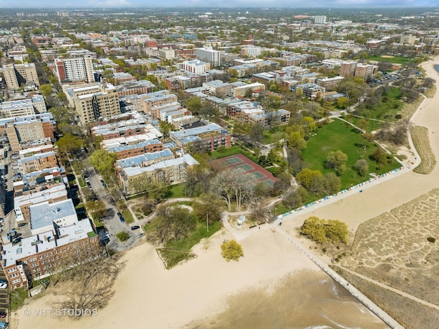 birds eye view of property featuring a city view