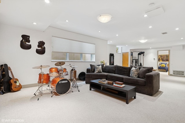 carpeted living area with baseboards, visible vents, and recessed lighting