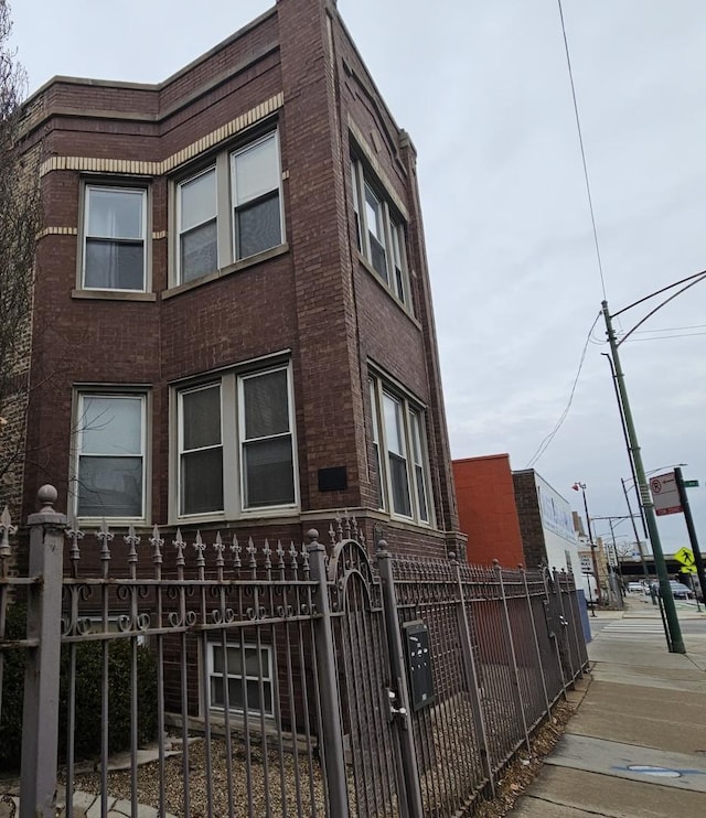 view of property with a fenced front yard