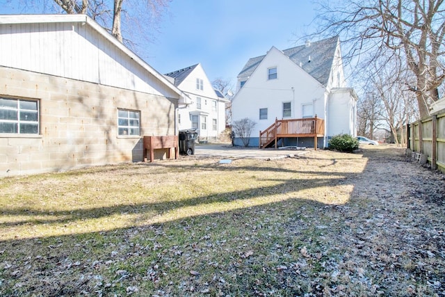 view of yard featuring a wooden deck