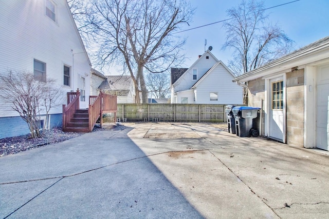 view of patio / terrace with fence and a wooden deck