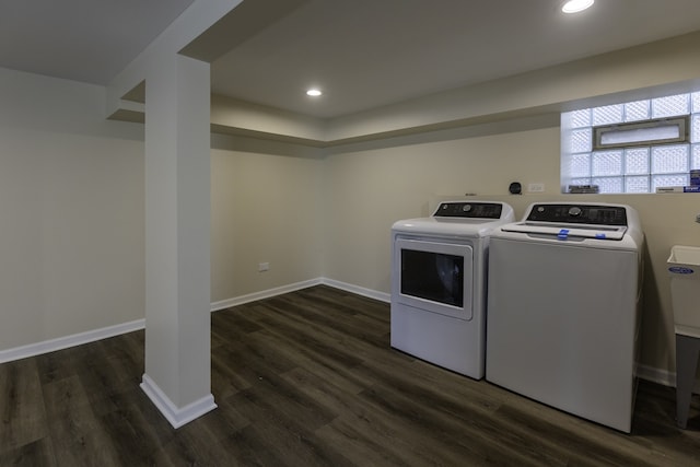 clothes washing area featuring washing machine and dryer, dark wood-style flooring, baseboards, and recessed lighting