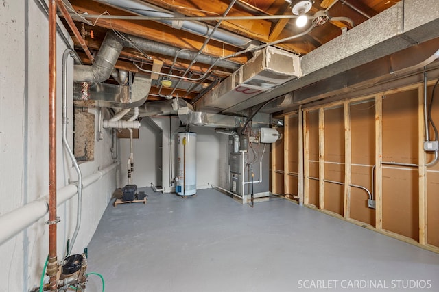 unfinished below grade area featuring heating unit and water heater