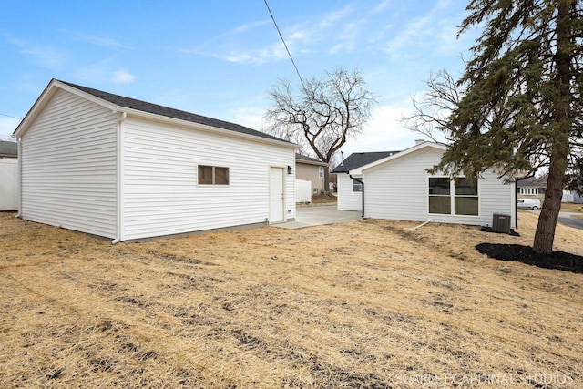 back of property with cooling unit and an outdoor structure