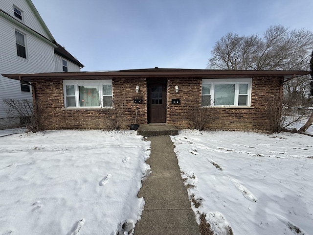 view of front of house with brick siding