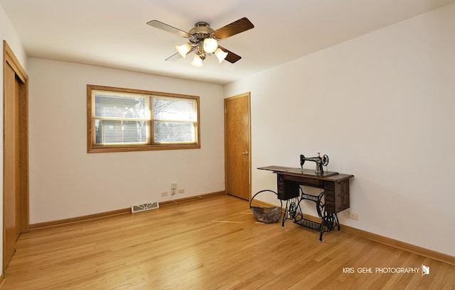 bedroom with visible vents, baseboards, light wood-type flooring, and ceiling fan