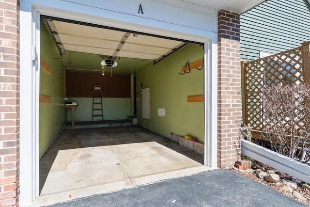 garage featuring a garage door opener