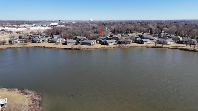 birds eye view of property featuring a residential view and a water view