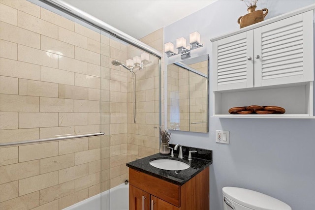 full bath with toilet, bathtub / shower combination, and vanity