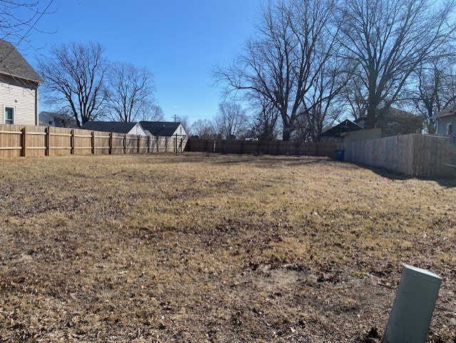 view of yard featuring a fenced backyard